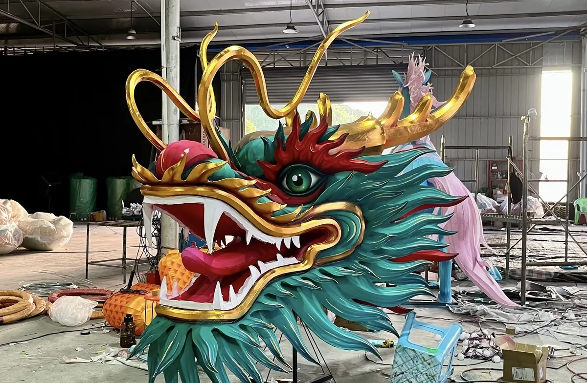 Chinese dragon head lantern in the workshop, a centrepiece often planned for the opening scene