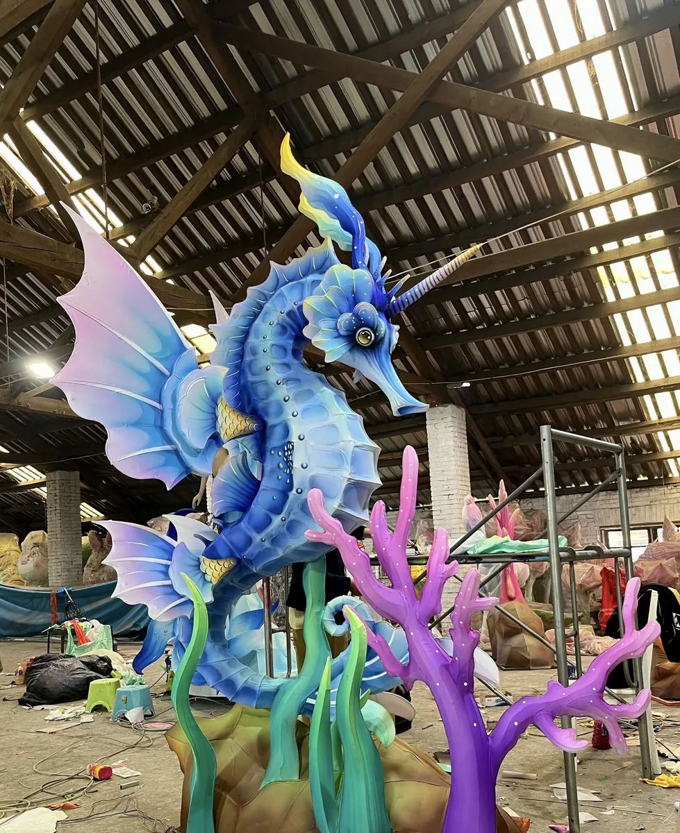 Blue seahorse-style lantern in the workshop, an example of a marine-themed custom build