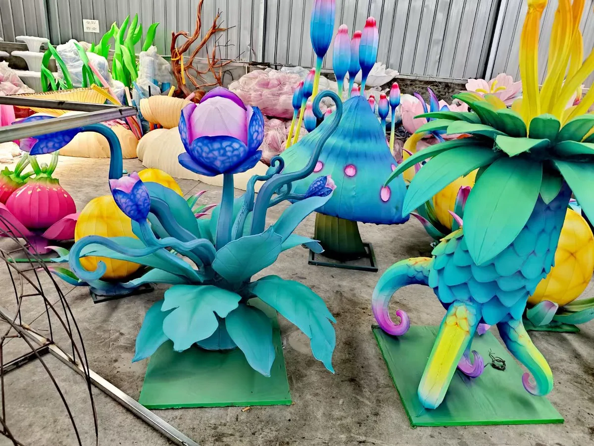 Colourful fantasy mushroom-and-plant lantern display, an example of an on-site assembly