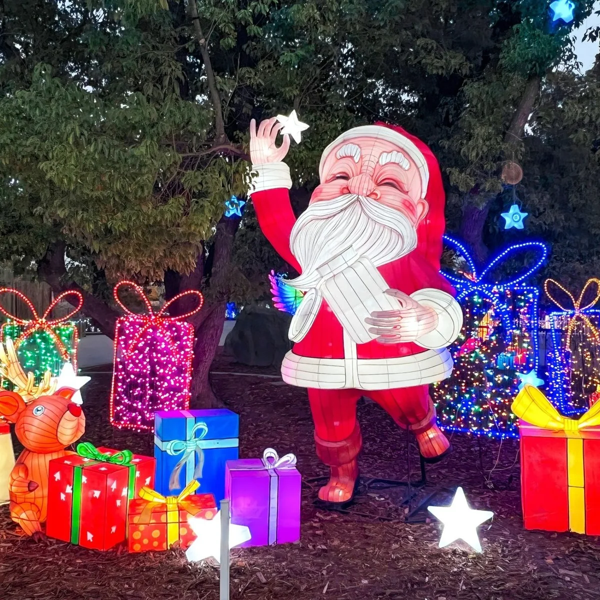 Giant Santa Claus and gift box Christmas lantern display