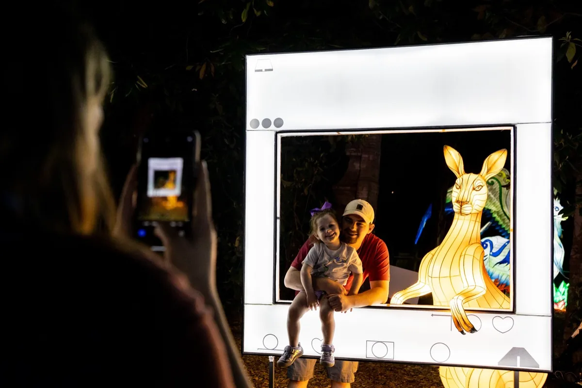 Custom light installation with a sculptural lantern figure